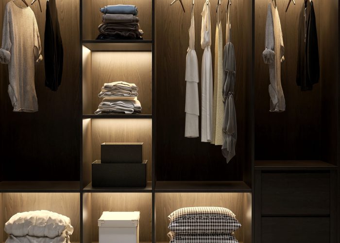 Modern, luxury brown wooden built in, walk in closet wardrobe on Modern, luxury brown wooden built in, walk in closet wardrobe on carpet floor in bedroom, shelf, drawer, hidden light with organized clothes, storage box for interior design, fashion background 3D